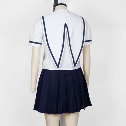 Full body shot of a mannequin wearing a white seifuku top with a navy blue jester collar and matching trim on the short sleeves. A dark navy blue skirt is visible beneath the top. The background is a plain white studio backdrop.